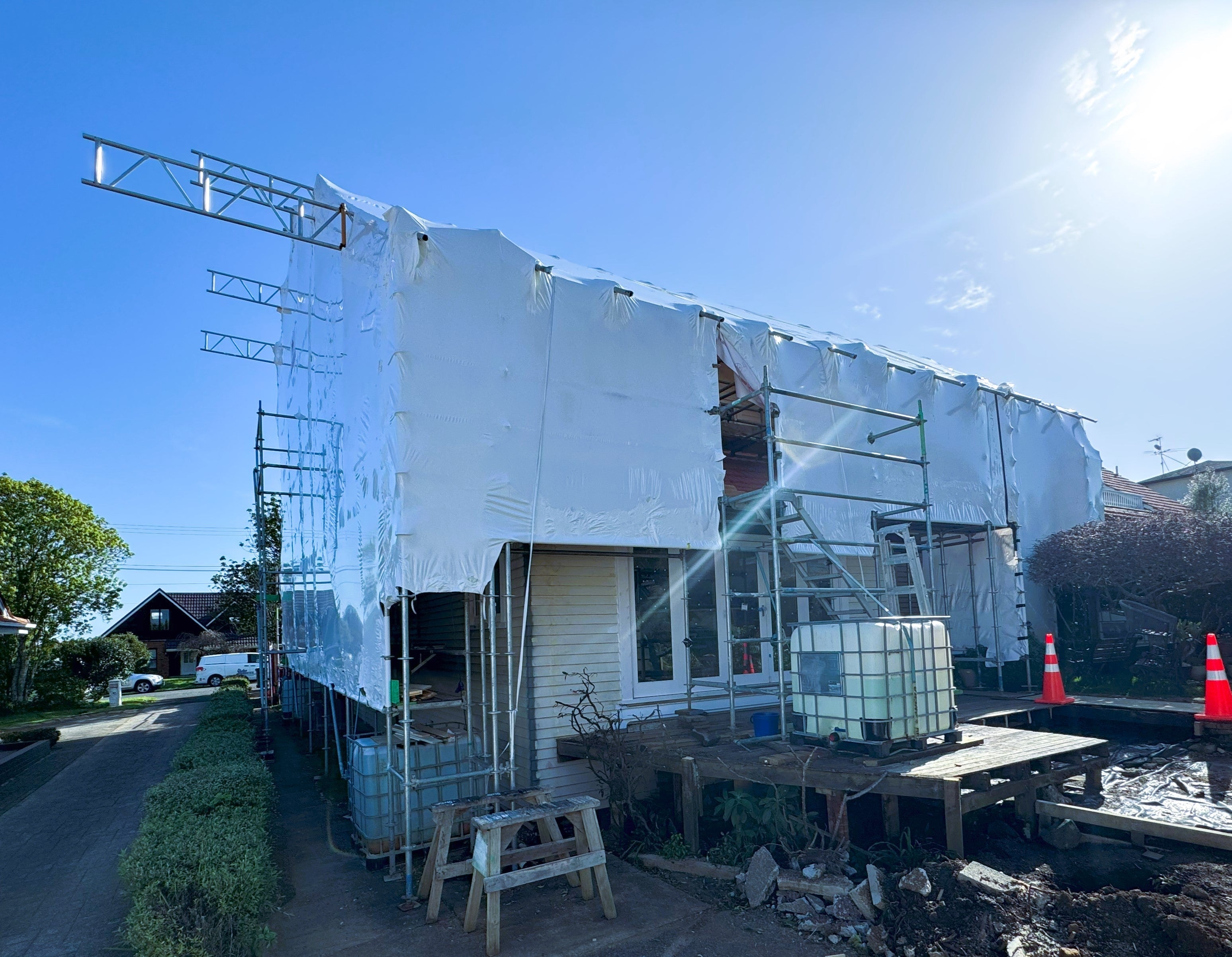 Keep Your Re-Roof Dry and Protected with SK Scaffold's Shrink Wrap